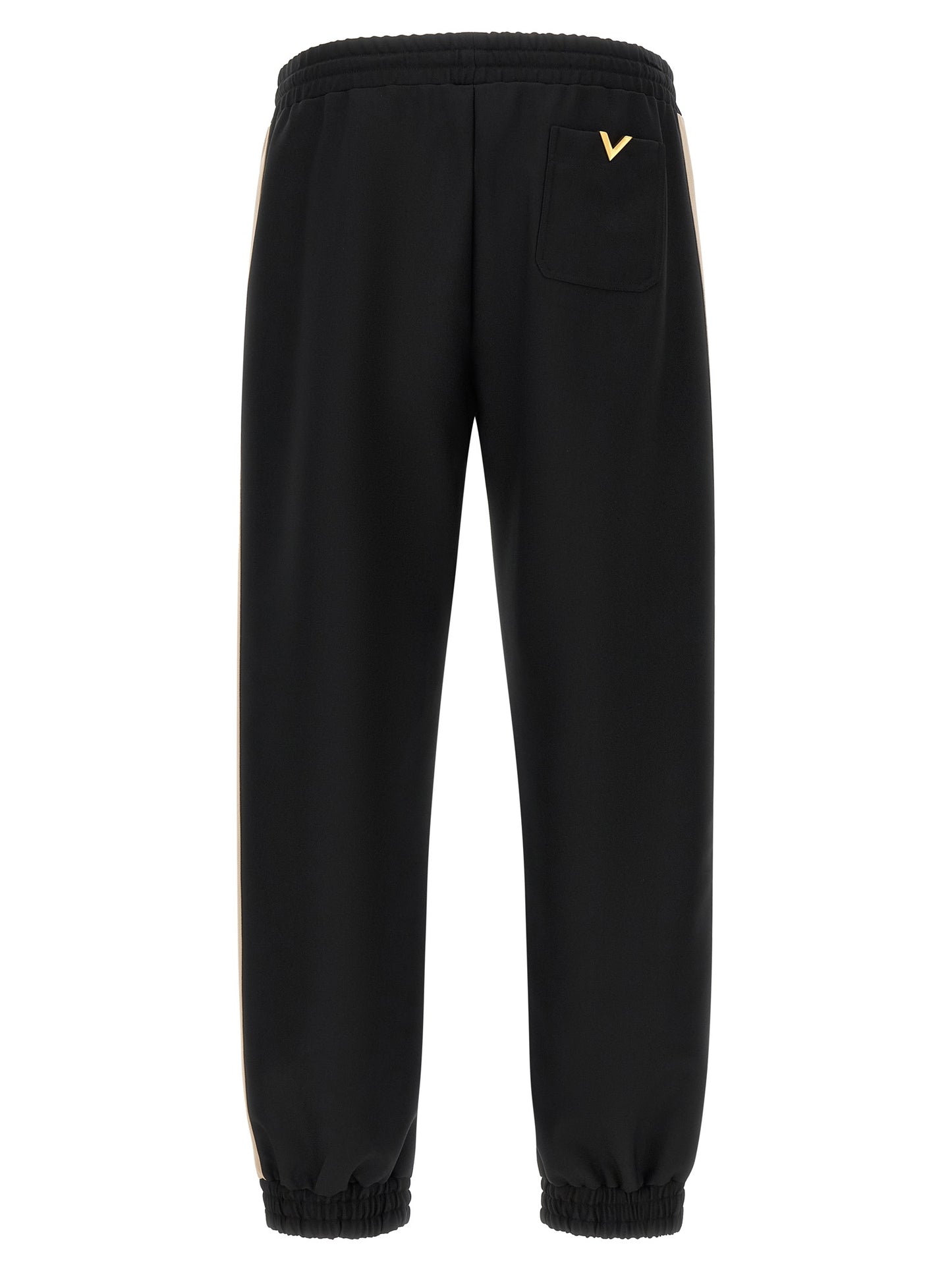 Joggers by Valentino Garavani for men in polyester black & gold features an sophisticated and athletic with a precise long, creating a sophisticated and sophisticated silhouette.
