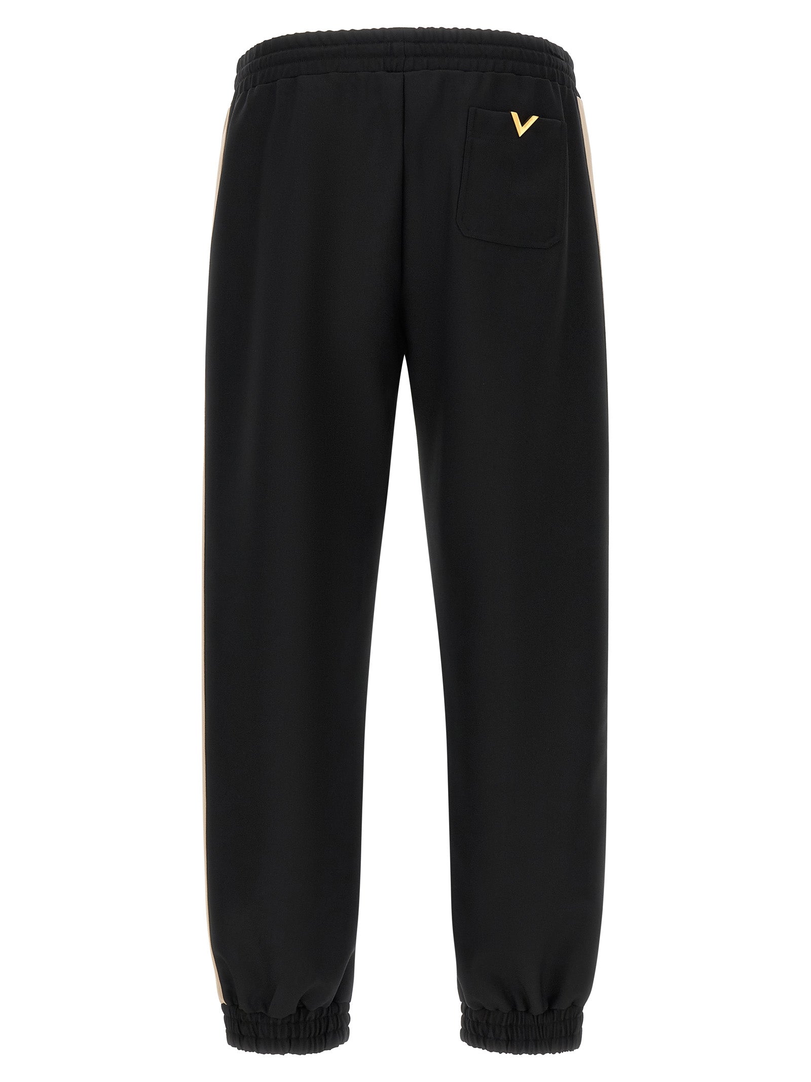 Joggers by Valentino Garavani for men in polyester black & gold features an sophisticated and athletic with a precise long, creating a sophisticated and sophisticated silhouette.