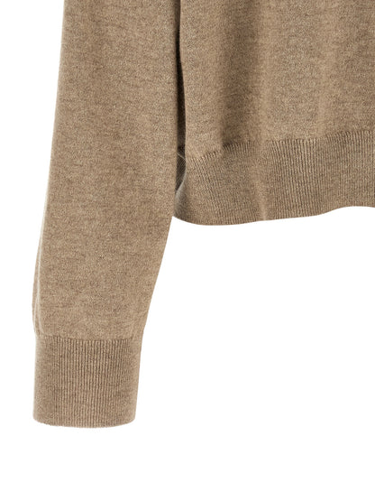 Cardigan by Brunello Cucinelli for women in cashmere & sequins beige & patterned features an crisp silhouette, showcasing a sophisticated turtle neckline and detail for a truly crisp finish.