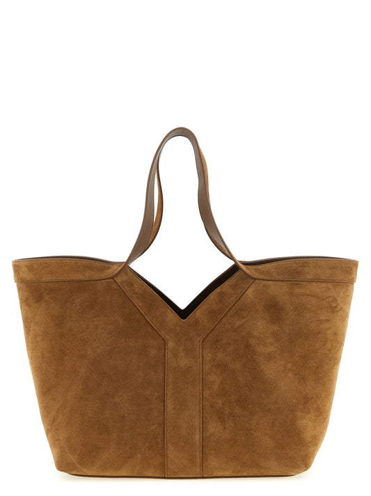 This Small Tote Bag by Saint Laurent for women in plush suede calfskin leather brown & signature features an on trend Plush Suede Calfskin Leather Small Tote Bag design with a secure snap & hook, ample , and on trend handle.