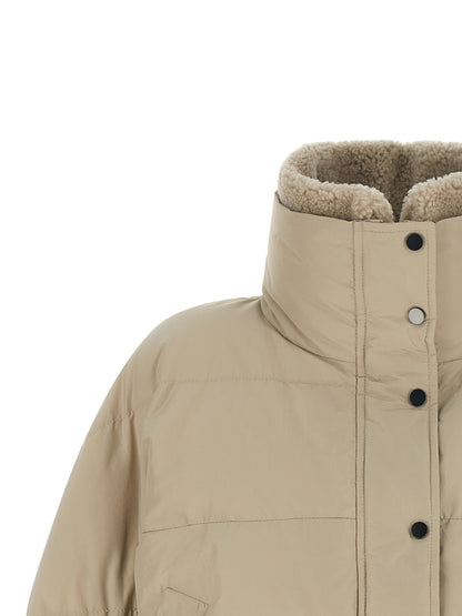 Puffer Jacket by Brunello Cucinelli for women in cotton polyester beige & signature features an on trend silhouette, showcasing refined breathable-design, pockets & insulated and a sophisticated high-neck neckline for a truly on trend finish.