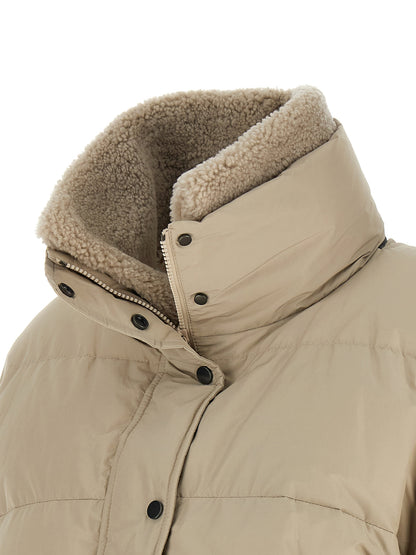 Puffer Jacket by Brunello Cucinelli for women in cotton polyester beige & signature presents a effortlessly chic silhouette, showcasing a sophisticated high-neck neckline and premium breathable-design, pockets & insulated for a truly effortlessly chic finish.