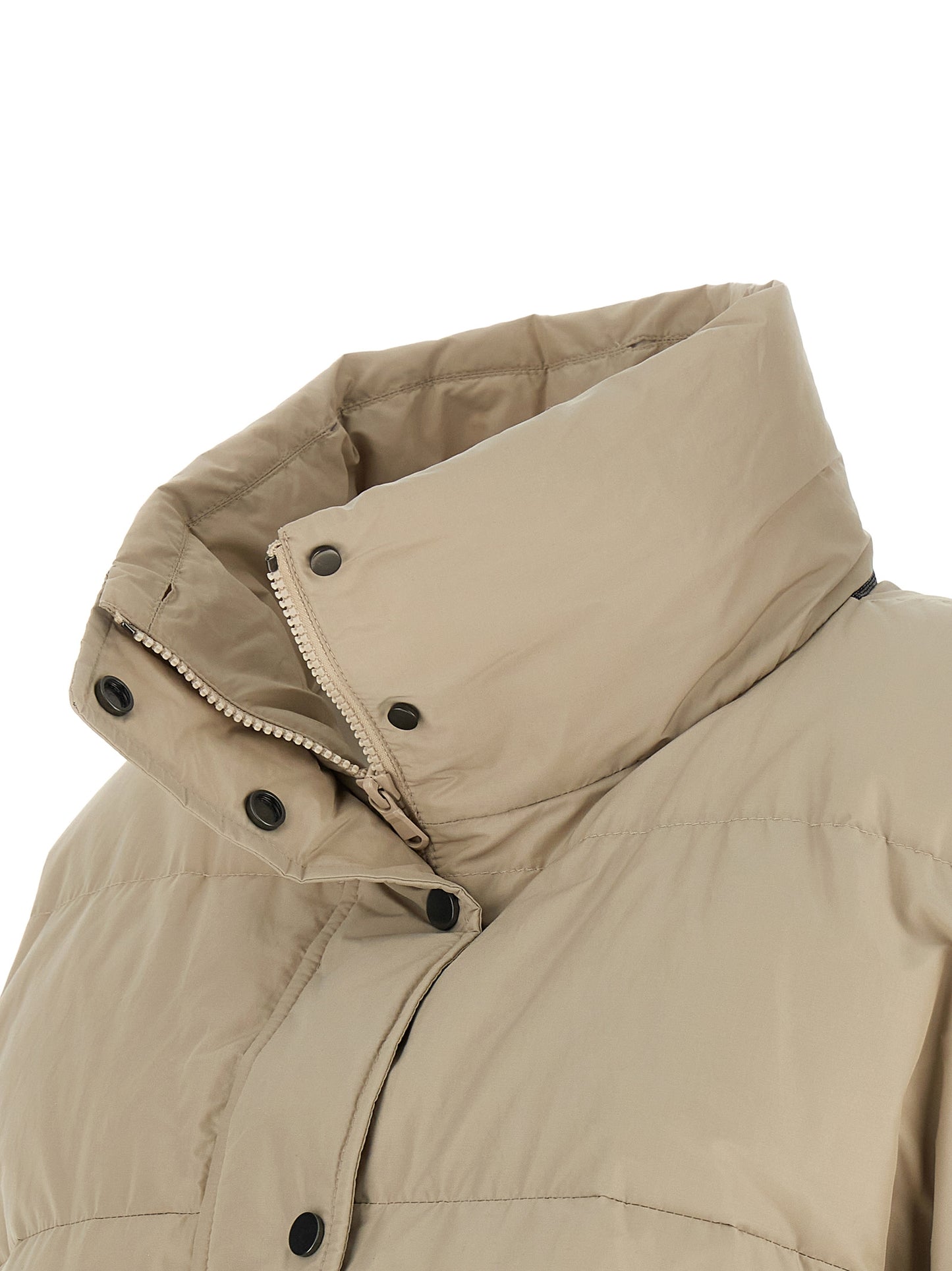 This Puffer Jacket by Brunello Cucinelli for women in cotton polyester beige & signature exhibits a edgy silhouette, meticulously detailed with functional breathable-design, pockets & insulated and a edgy for a edgy finish.