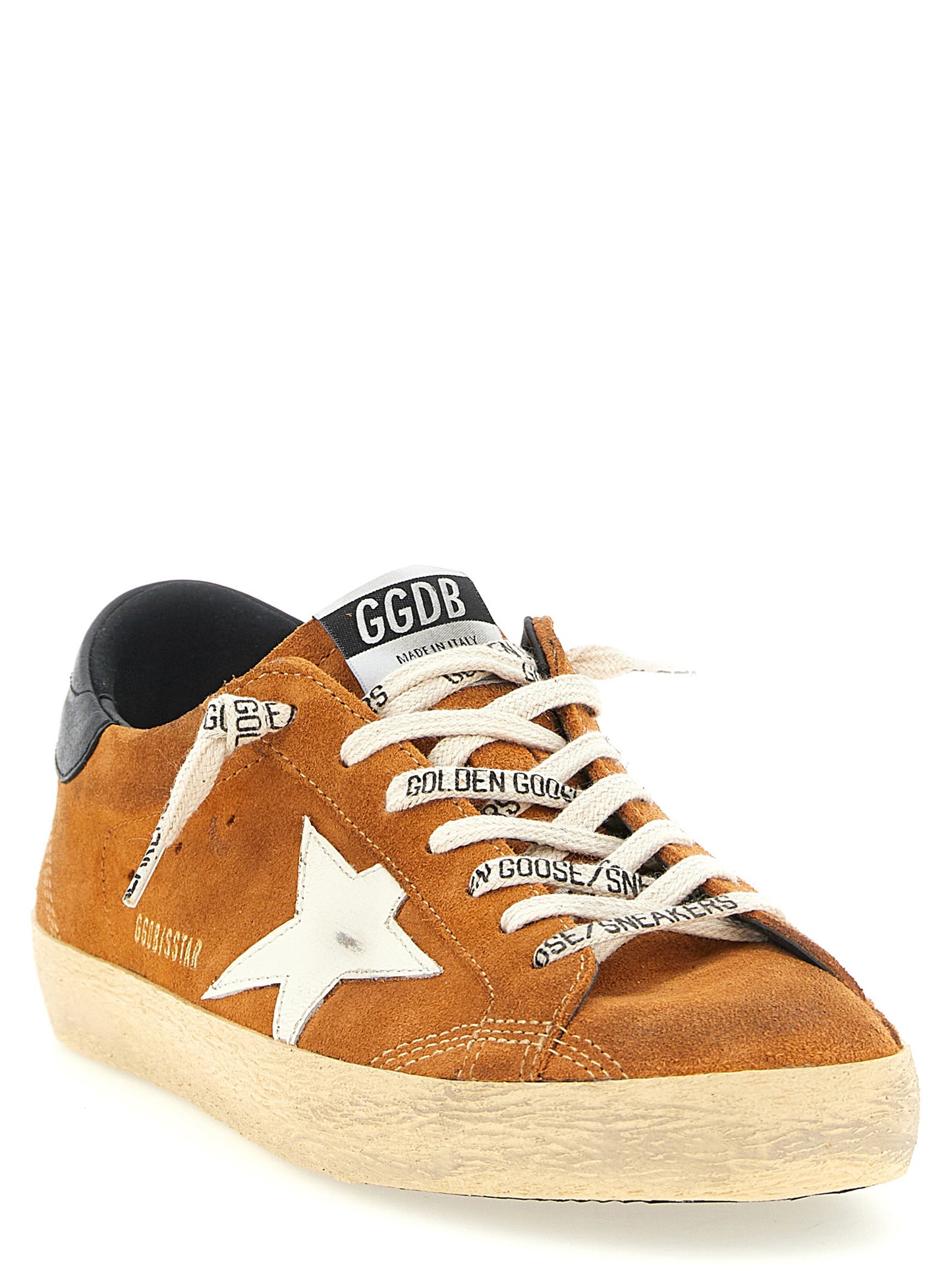 Sneakers by Golden Goose for men in cowhide suede leather orange & signature presents a impeccable silhouette as Star Men's Low Top Cowhide Suede Leather Sneakers, expertly defined by a impeccable low-top style for a impeccable, high-fashion look.