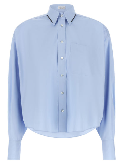 Blouse by Brunello Cucinelli for women in cotton light-blue & signature presents a discerning silhouette, showcasing a sophisticated and for a truly discerning finish.