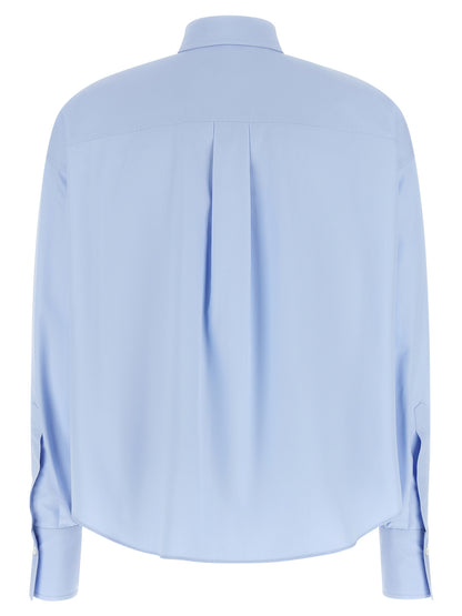 Blouse by Brunello Cucinelli for women in cotton light-blue & signature, featuring a nuanced and nuanced for a sophisticated finish.