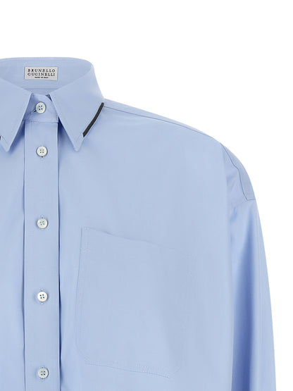 Blouse by Brunello Cucinelli for women in cotton light-blue & signature, featuring a nuanced and nuanced for a sophisticated finish.