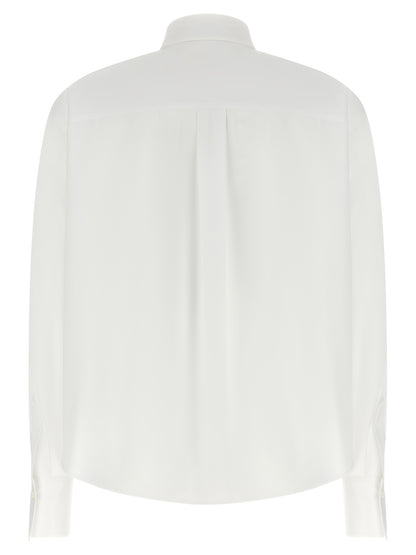 Blouse by Brunello Cucinelli for women in cotton white & signature showcases a sleek silhouette, elegantly detailed with a sleek and for a sleek finish.