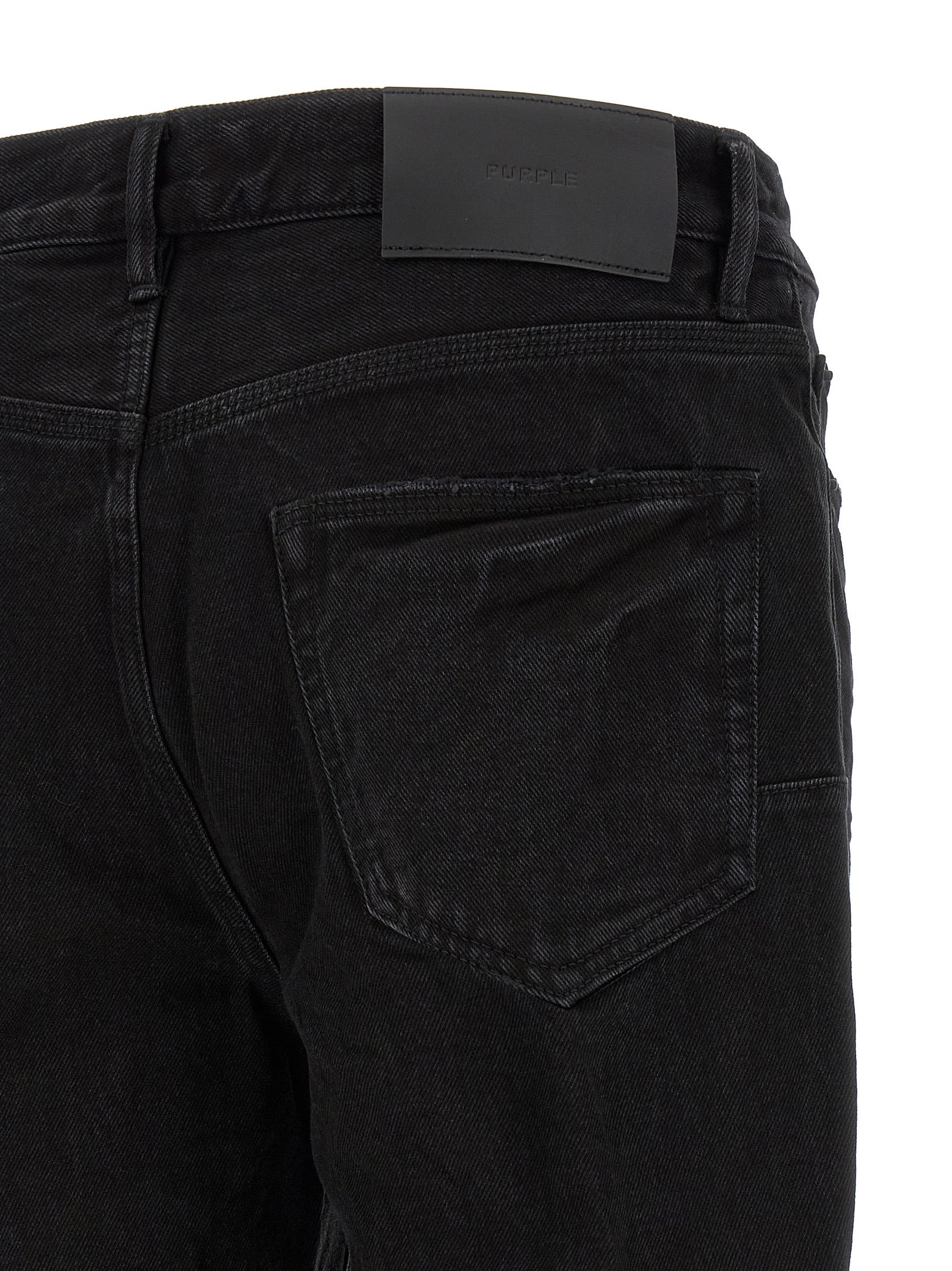 Jeans by PURPLE for men in denim cotton black & purple presents a tailored silhouette, showcasing a tailored flared and long cut with a refined mid rise for a truly tailored aesthetic.