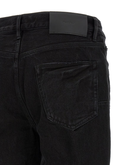Jeans by PURPLE for men in denim cotton black & purple presents a tailored silhouette, showcasing a tailored flared and long cut with a refined mid rise for a truly tailored aesthetic.