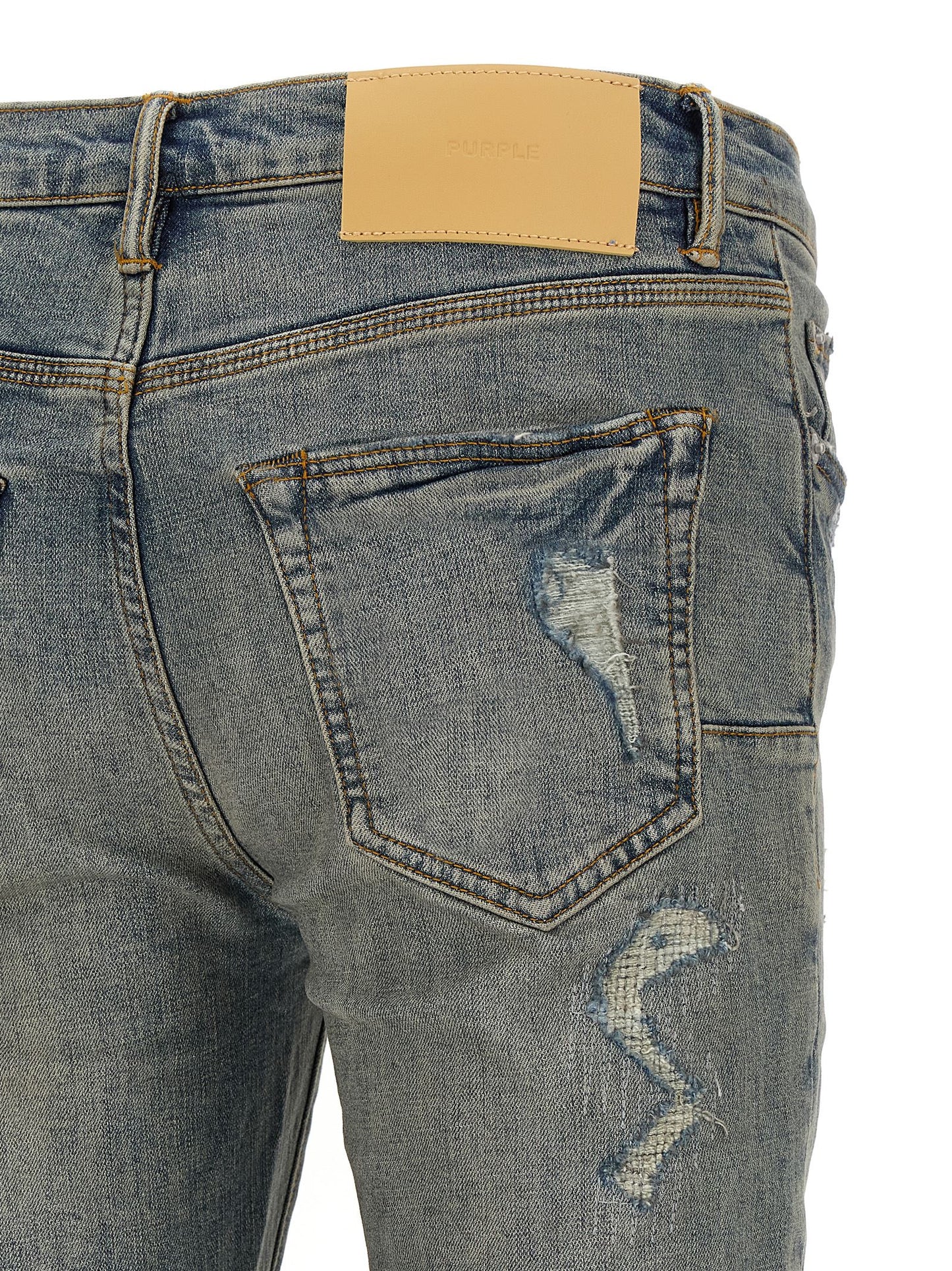 Jeans by PURPLE for men in stretch denim cotton light-blue, purple & signature presents a tailored silhouette, showcasing a tailored slim and long cut with a refined low rise for a truly tailored aesthetic.