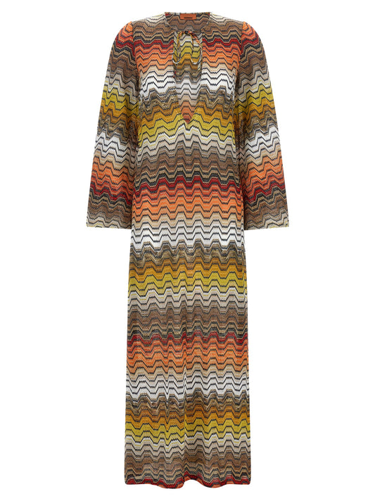Dress by Missoni for women in viscose multicolor & patterned features a dramatic silhouette, showcasing an elegant v-neck neckline and long-sleeve that flows into a dramatic long.
