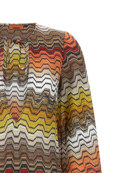 Dress by Missoni for women in viscose multicolor & patterned features an cute silhouette, detailed with a and v-neck neckline that elegantly flows into a cute long.