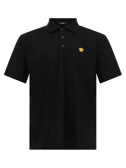 Polo Shirt by Versace for men in cotton black & jacquard showcases a sharp silhouette, detailed with a refined and sharp short-sleeve for a sophisticated finish.