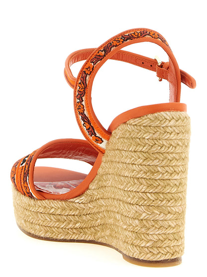 Wedge Ankle Strap Sandals by Dolce & Gabbana for women in lamb leather & cotton orange & patterned features an effortlessly chic silhouette from the Maiolica Women's Lamb Leather & Cotton Wedge Ankle Strap Sandals collection, showcasing a effortlessly chic wedge and elegant .