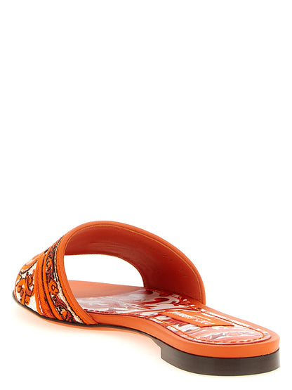 Sliders Flat Shoes by Dolce & Gabbana for women in lamb leather & cotton orange features an captivating silhouette, showcasing the captivating style of the Maiolica Women's Lamb Leather & Cotton Sliders Flat Shoes with its distinct and refined .