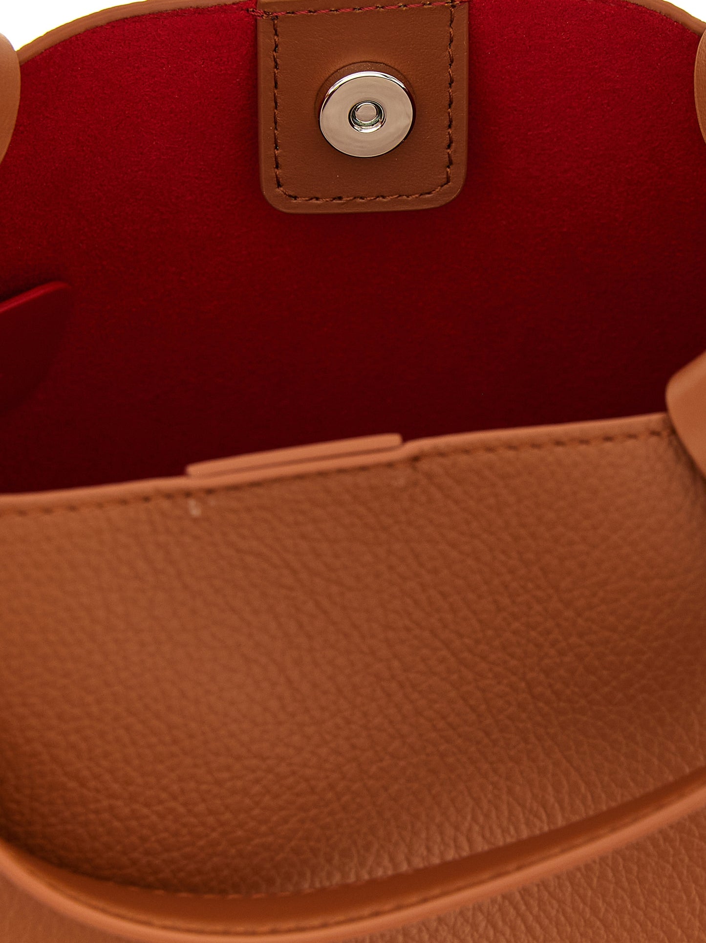 Mini Shopper Tote Bag by Christian Louboutin for women in bos taurus calfskin leather brown & red features an sumptuous Bettina Bos Taurus Calfskin Leather Mini Shopper Tote Bag design with a secure magnetic, ample , and versatile shoulder-strap, adjustable-strap & handle for an sumptuous finish.