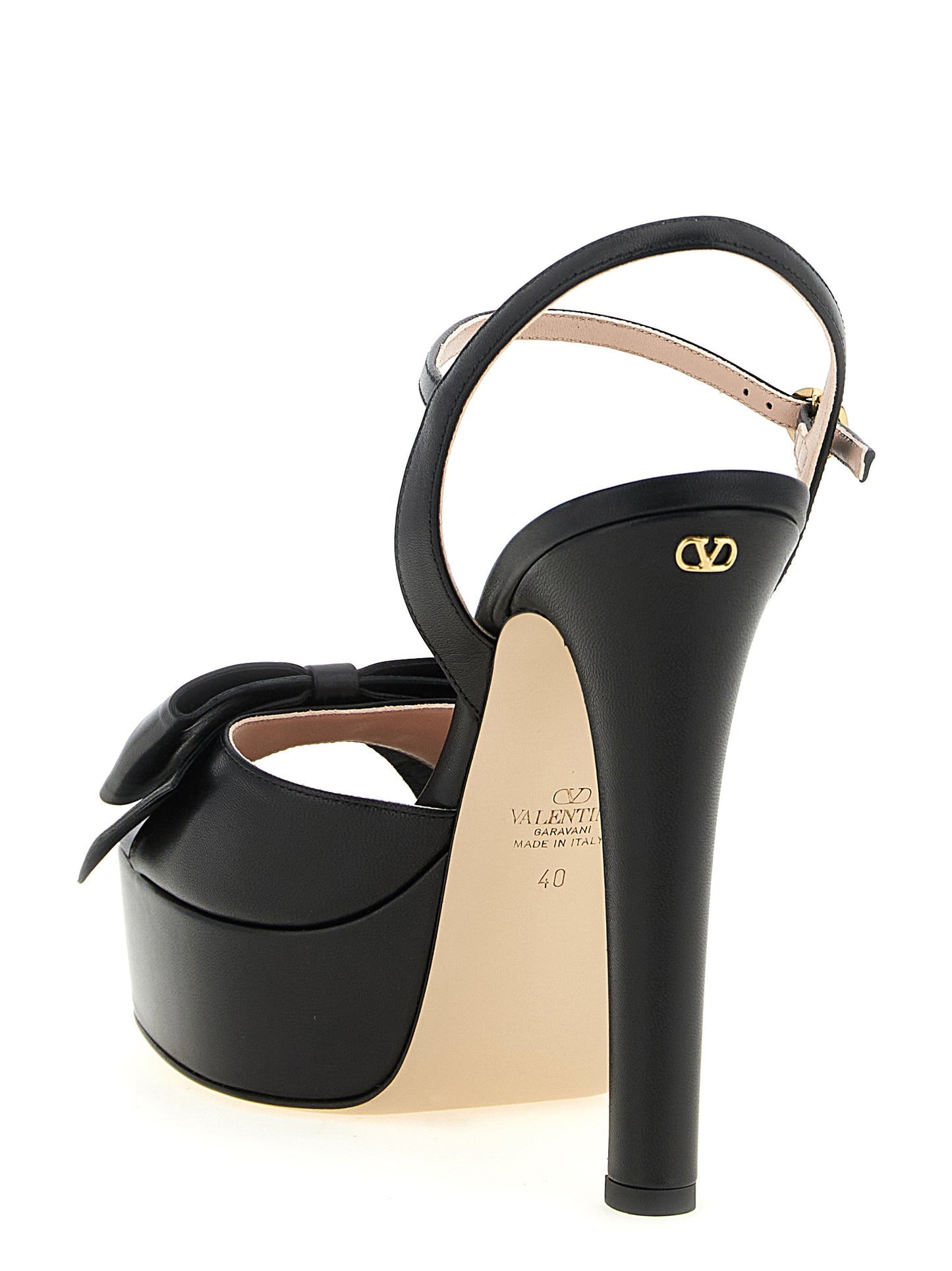 Platform Stiletto Ankle Strap Sandals by Valentino Garavani for women in calfskin leather black, floral & signature features an exquisite silhouette, showcasing the exquisite V Logo Women's Calfskin Leather Platform Stiletto Ankle Strap Sandals with a stiletto platform and .