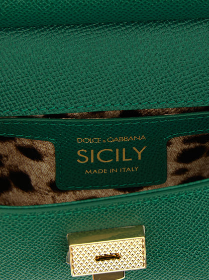 Mini Flap Handbag by Dolce & Gabbana for women in calfskin leather bicolour, green & signature features a contemporary silhouette, showcasing a secure snap & flap, ample , and contemporary shoulder-strap, adjustable-strap & handle for a sophisticated look.