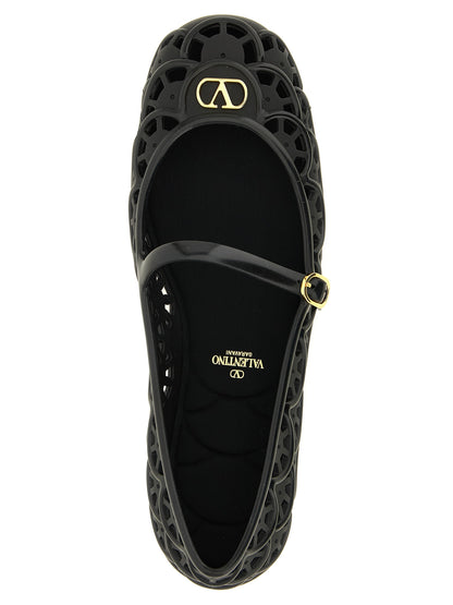 Ballet Flat Shoes by Valentino Garavani for women in pvc black, patterned & signature features an captivating silhouette, showcasing the captivating style of the V Logo Women's PVC Ballet Flat Shoes with its distinct and refined .