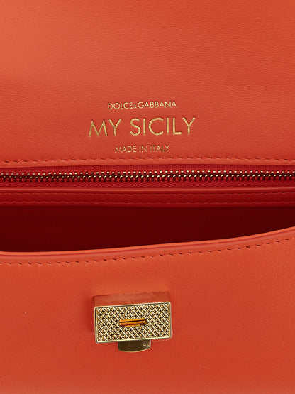 Mini Flap Handbag by Dolce & Gabbana for women in pvc & bos taurus suede calf leather orange features a signature silhouette, showcasing a secure flap and signature with versatile for a sophisticated look.