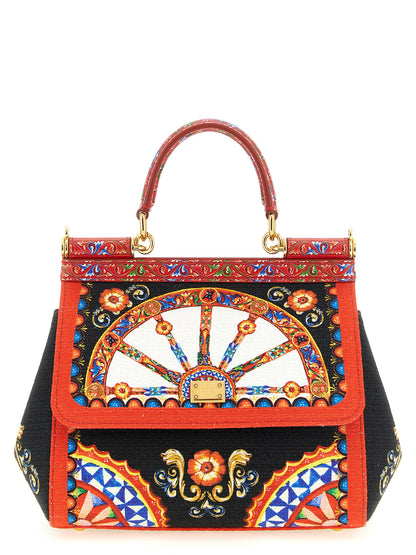 Flap Handbag by Dolce & Gabbana for women in stretch cotton canvas linen & viscose multicolor & print features a exquisite silhouette, showcasing a secure snap & flap and exquisite with versatile shoulder-strap, handle & adjustable-strap for a exquisite finish.