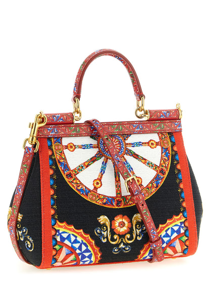 Flap Handbag by Dolce & Gabbana for women in stretch cotton canvas linen & viscose multicolor & print features a refined silhouette, showcasing a secure snap & flap, organized , and versatile shoulder-strap, handle & adjustable-strap for a refined finish.