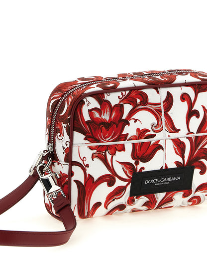 Handbag by Dolce & Gabbana for unisex in calfskin leather cotton & palladium multicolor, palladium, red & print features a contemporary silhouette, showcasing a secure , ample , and contemporary handle for a sophisticated look.