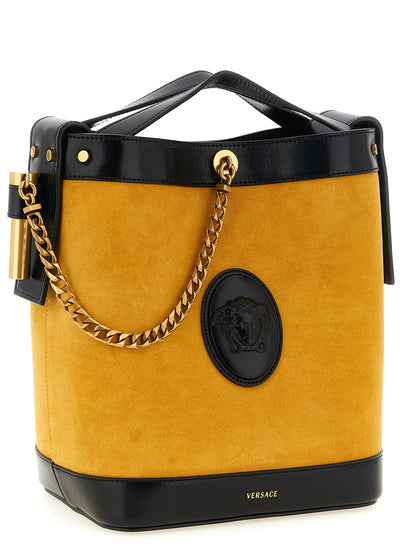 Small Bucket Shoulder Bag by Versace for women in calfskin leather bicolour & yellow features an effortlessly chic silhouette with a secure magnetic, ample , and versatile handle for effortlessly chic everyday luxury.