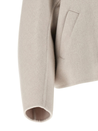 Overcoat by Brunello Cucinelli for women in cashmere virgin wool gray features a contemporary silhouette showcasing a contemporary and refined for a sophisticated finish.