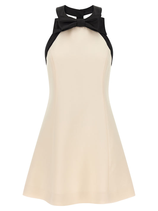 Dress by Valentino Garavani for women in silk crepe & virgin wool bicolour, black & white features an eye catching silhouette with a sophisticated , elegant sleeveless, and a refined short mini for a eye catching aesthetic.