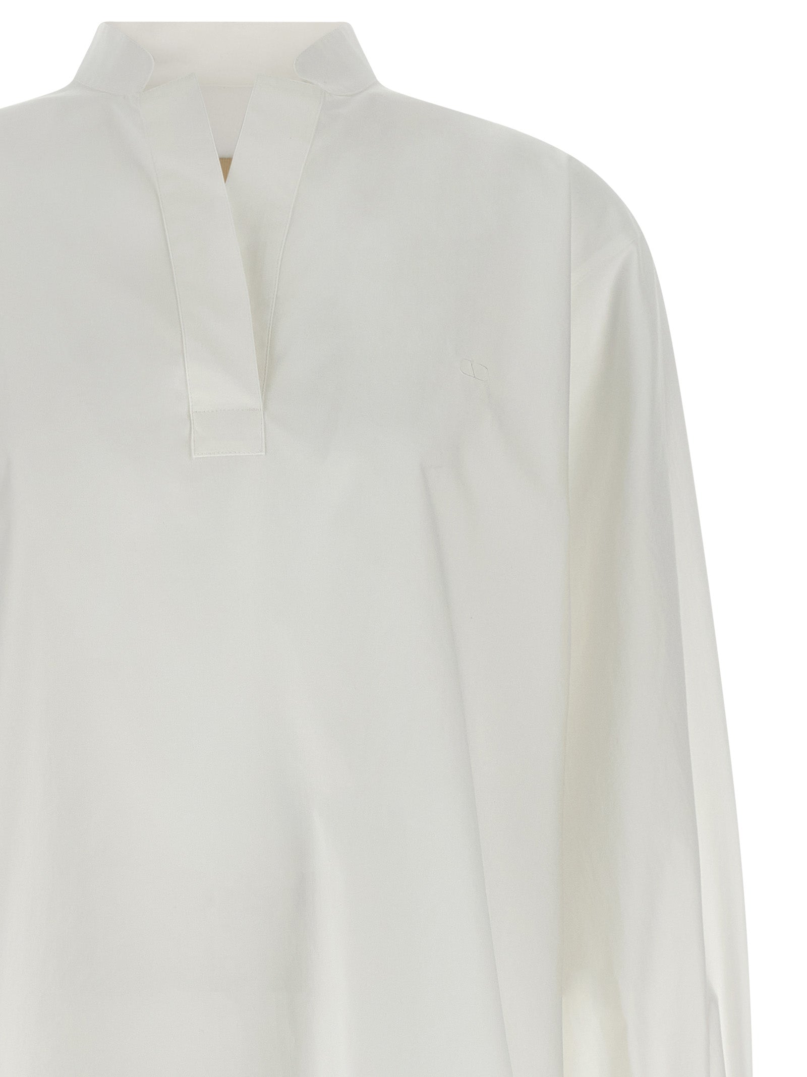 Shirt by Valentino Garavani for women in cotton white features an polished silhouette, showcasing a sophisticated v-neck high-neck neckline and detail for a truly polished finish.
