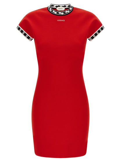 Dress by Versace for women in cotton multicolor, red, patterned & jacquard features an sultry silhouette defined by a and , falling to an sultry short mini for a sultry look.