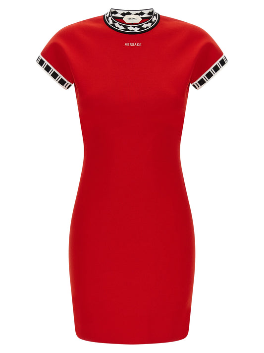 Dress by Versace for women in cotton multicolor, red, patterned & jacquard features an sultry silhouette defined by a and , falling to an sultry short mini for a sultry look.