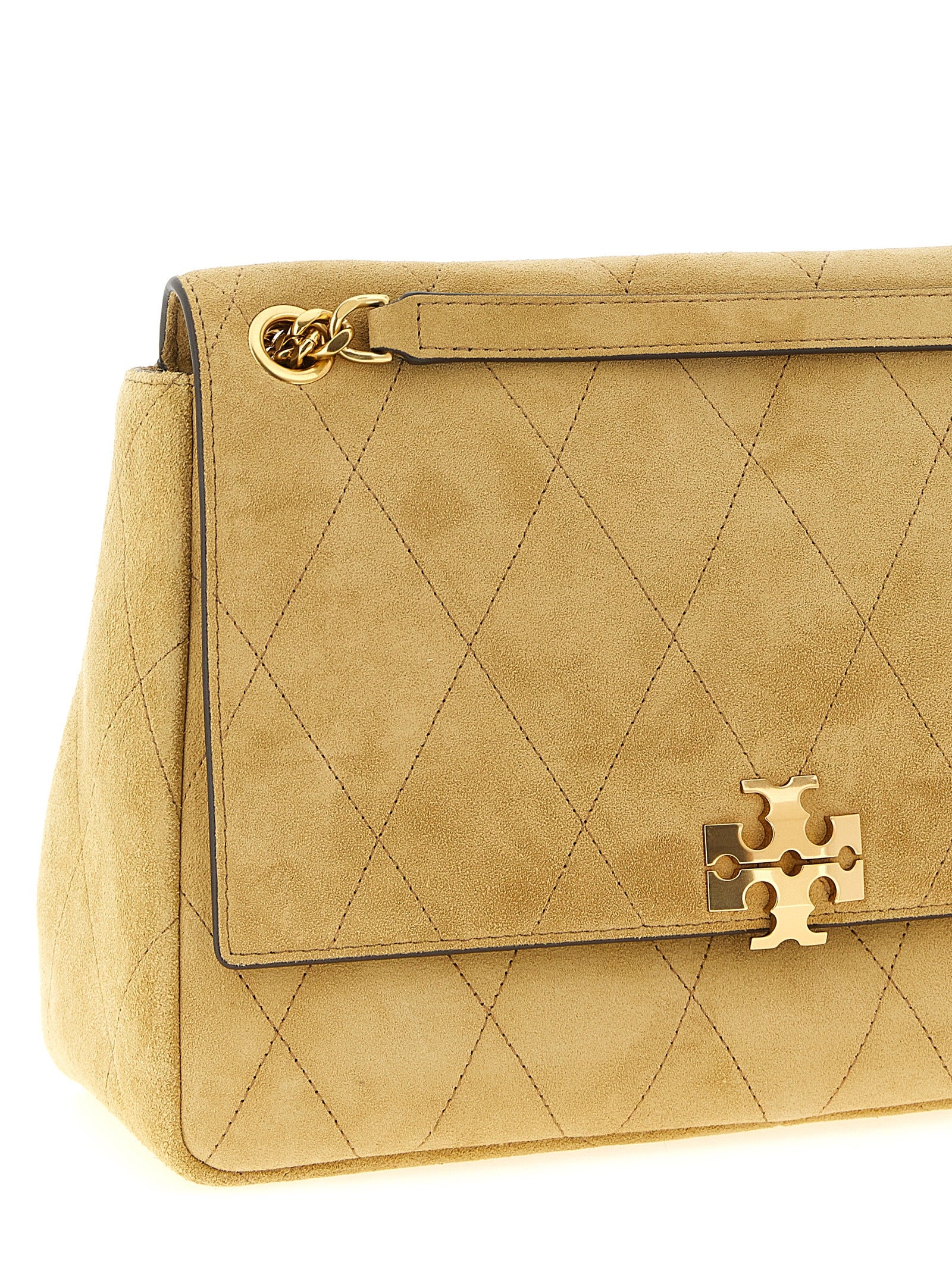 Medium Shoulder Flap Bag by Tory Burch for women in suede calfskin leather beige features a effortless sophistication silhouette, secured by a flap & magnetic with ample and versatile shoulder-strap for a effortless sophistication finish.