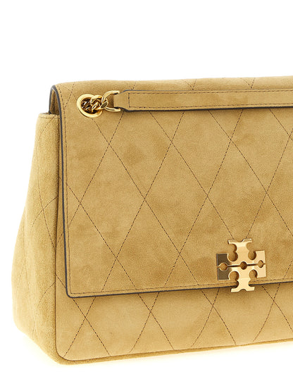 Medium Shoulder Flap Bag by Tory Burch for women in suede calfskin leather beige features a effortless sophistication silhouette, secured by a flap & magnetic with ample and versatile shoulder-strap for a effortless sophistication finish.