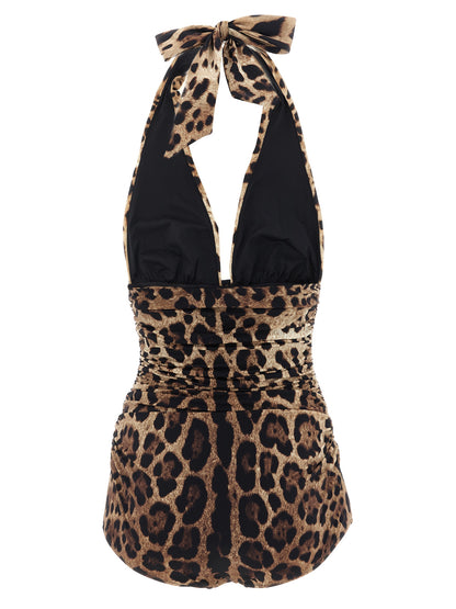 One-Piece Swimsuit by Dolce & Gabbana for women in stretch polyamide brown & print features a exquisite silhouette, showcasing the exquisite design of this Waves Women's Stretch Polyamide One-Piece Swimsuit with a exquisite fit and cut.