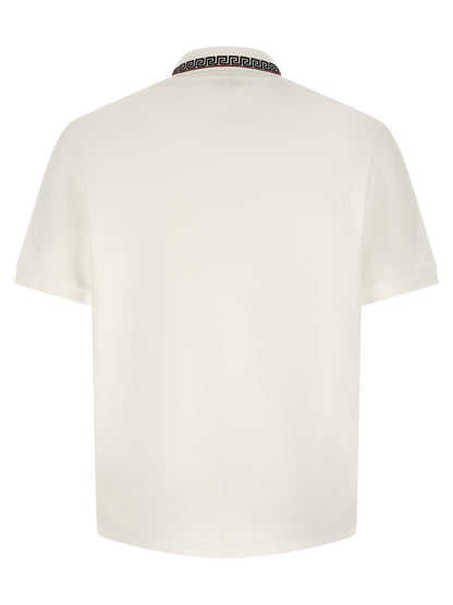 This Polo Shirt by Versace for men in cotton white presents a flawless silhouette, showcasing flawless detailing and a refined for a truly flawless aesthetic.