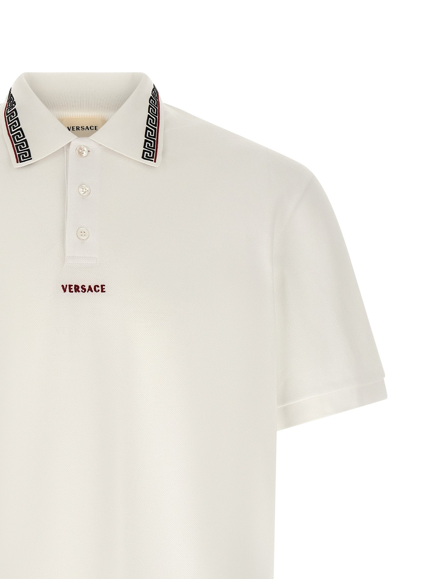 Polo Shirt by Versace for men in cotton white showcases a sharp silhouette, detailed with a refined and sharp for a sophisticated finish.