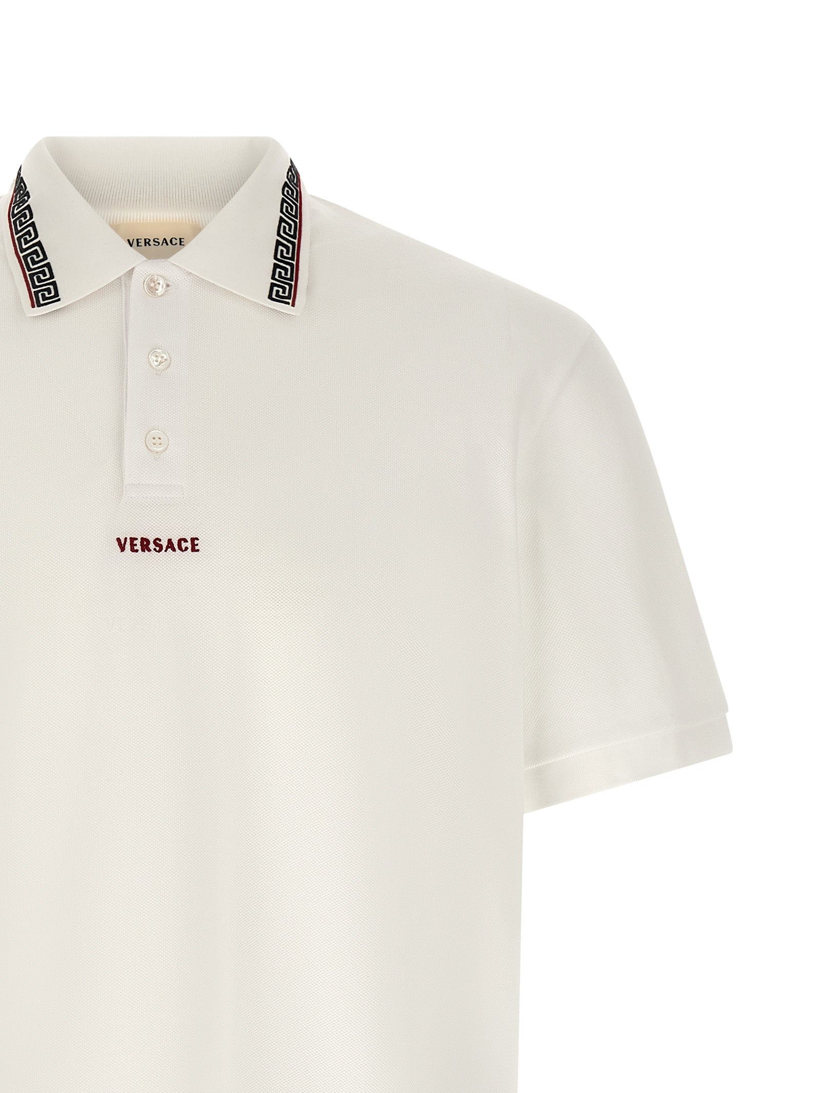 Polo Shirt by Versace for men in cotton white showcases a sharp silhouette, detailed with a refined and sharp for a sophisticated finish.