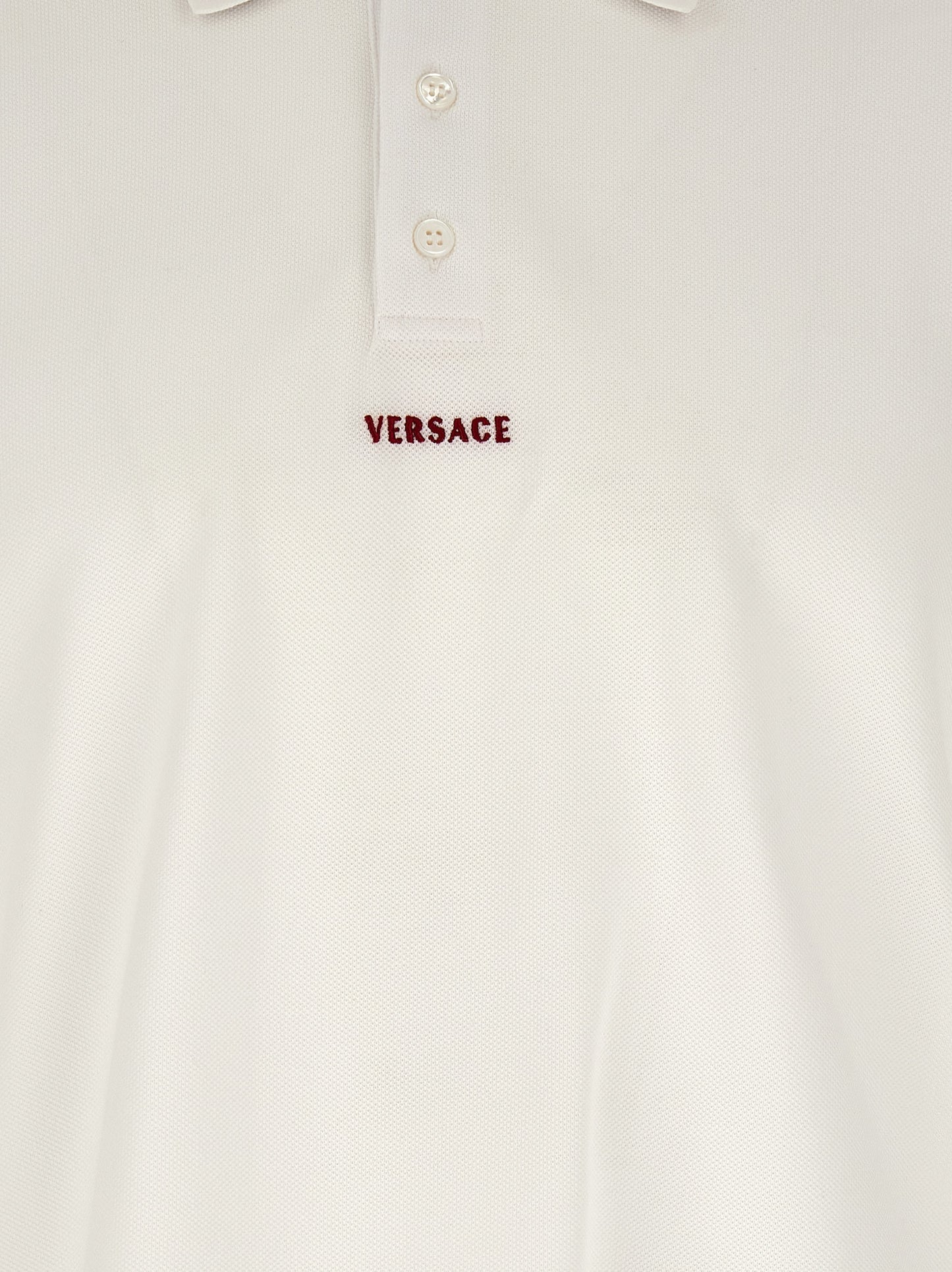 Polo Shirt by Versace for men in cotton white presents a distinguished silhouette, showcasing a sophisticated and distinguished for a truly distinguished finish.