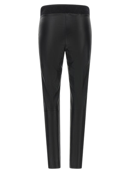 Activewear Leggings by Brunello Cucinelli for women in virgin wool & nappa lamb leather black features a contemporary silhouette, showcasing advanced with a contemporary leggings, long, and .
