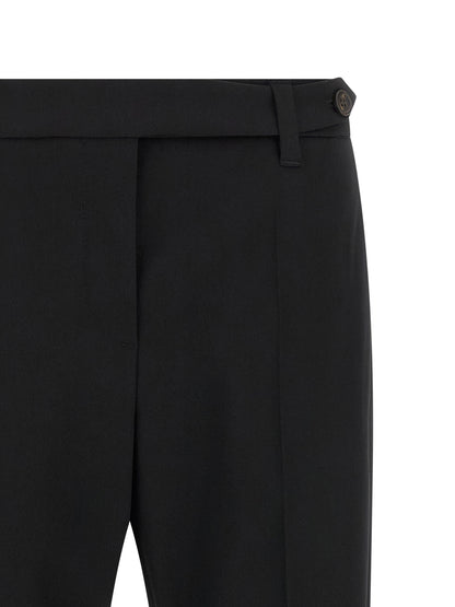Trousers by Brunello Cucinelli for women in virgin wool black features a artisanal silhouette, showcasing a sophisticated tapered-leg with a long and for a artisanal finish.