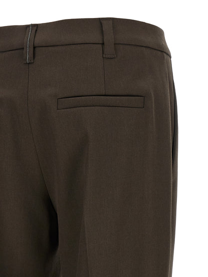 Trousers by Brunello Cucinelli for women in virgin wool brown features an sartorial silhouette, showcasing a precise tapered-leg and long with a sartorial for a refined look.