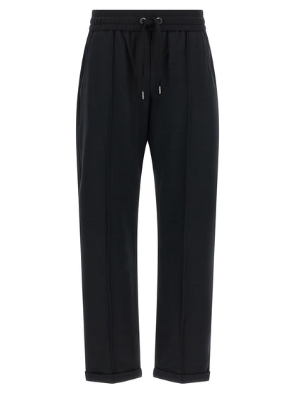 Joggers by Brunello Cucinelli for women in stretch cotton black features a refined silhouette with a refined flared, relaxed-fit & cropped, defined by a high rise and a refined cropped for a refined finish.