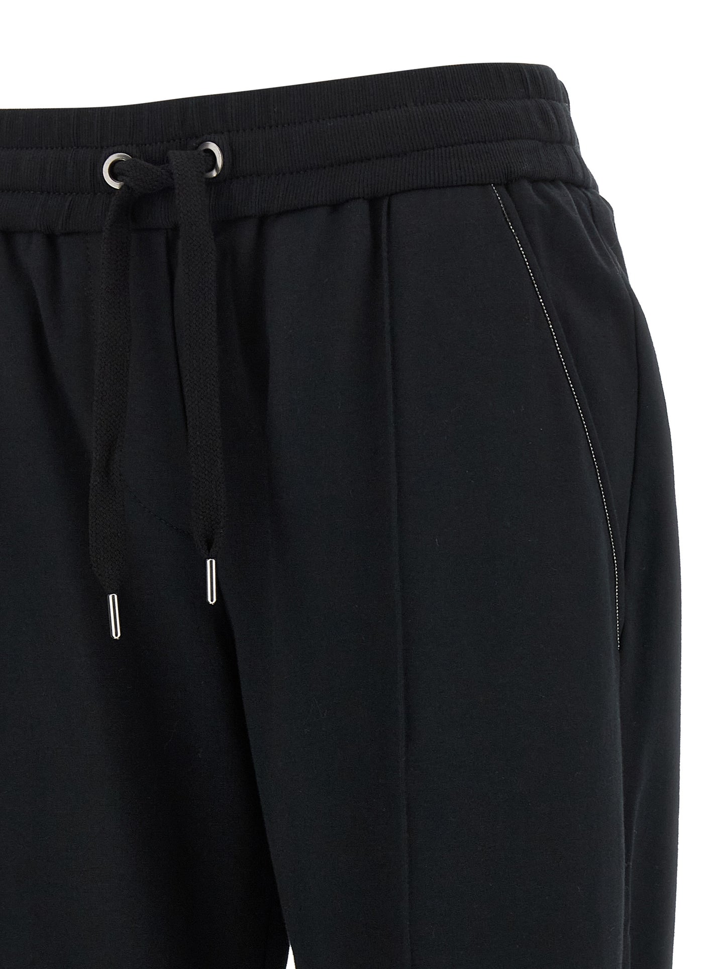 Joggers by Brunello Cucinelli for women in stretch cotton black features an refined tailoring silhouette, showcasing a premium flared, relaxed-fit & cropped with a high rise and cropped cut for a refined tailoring look.