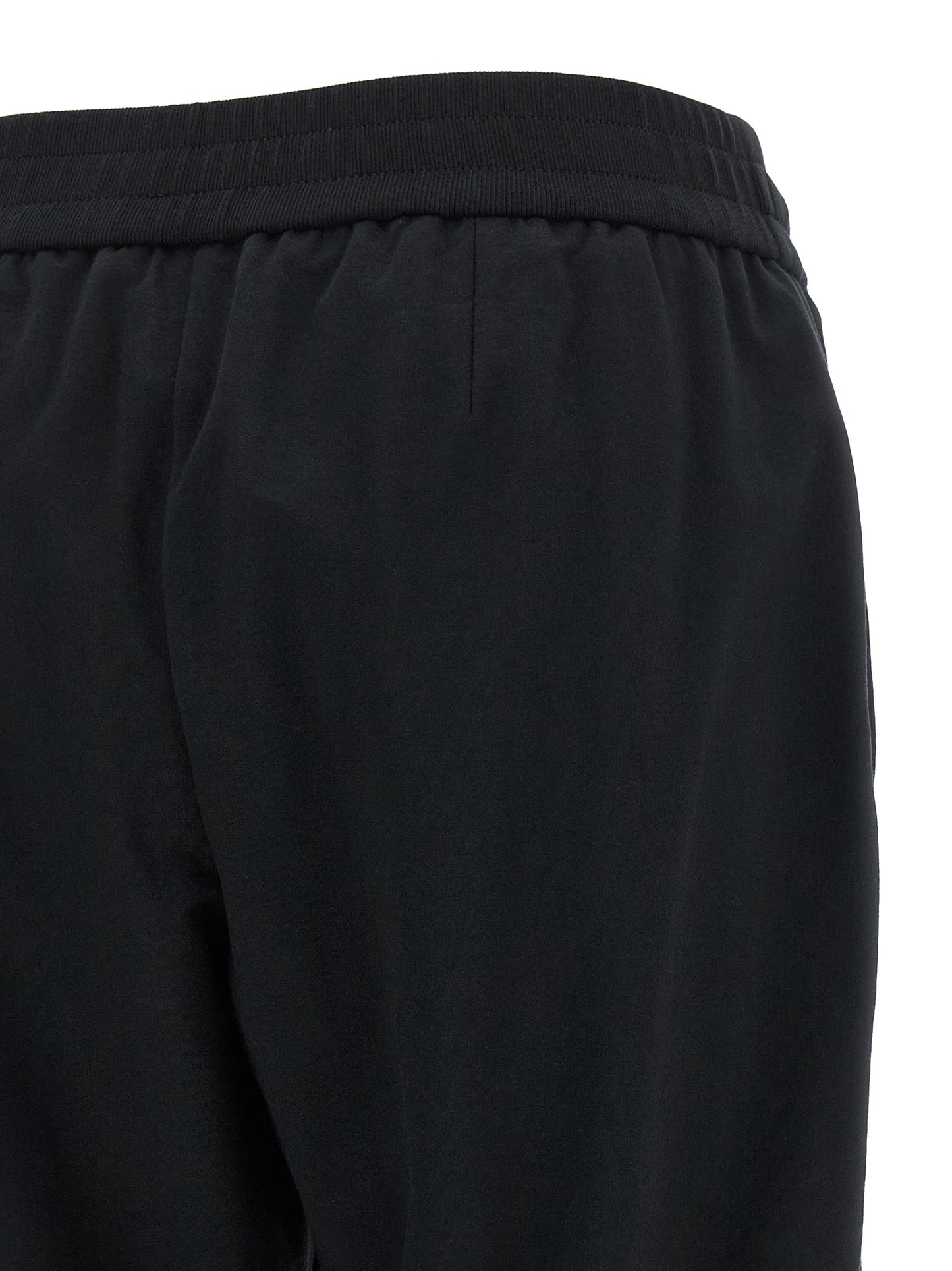 Joggers by Brunello Cucinelli for women in stretch cotton black presents a tailored silhouette, showcasing a tailored flared, relaxed-fit & cropped and cropped cut with a refined high rise for a truly tailored aesthetic.