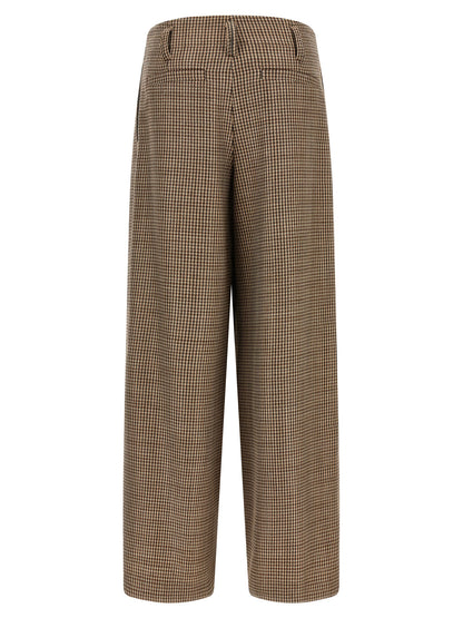 Trousers by Brunello Cucinelli for women in polyamide & virgin wool brown & patterned presents a perennial silhouette, meticulously tailored with a flared & wide cut, long finish, and an elegant .