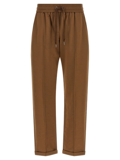 Joggers by Brunello Cucinelli for women in stretch cotton brown features a polished silhouette with a polished flared & cropped, reaching a polished cropped and finished with a polished high rise.