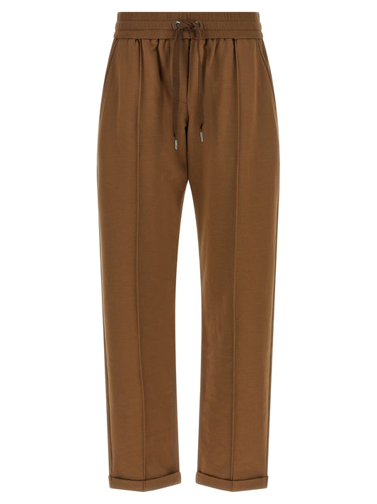 Joggers by Brunello Cucinelli for women in stretch cotton brown features a polished silhouette with a polished flared & cropped, reaching a polished cropped and finished with a polished high rise.